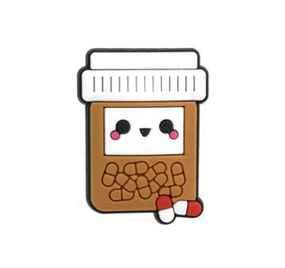 Crocs Jibbitz Charm (2-2.5$ each) - Pill box Brown image